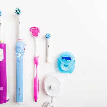 Electric toothbrushes on a counter